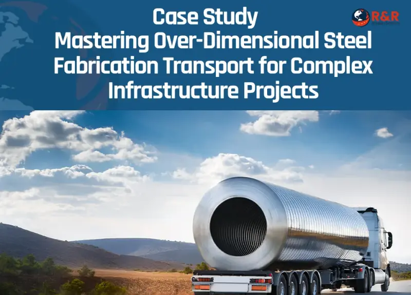 Over-dimensional structural steel load being transported on a specialized trailer for infrastructure project.